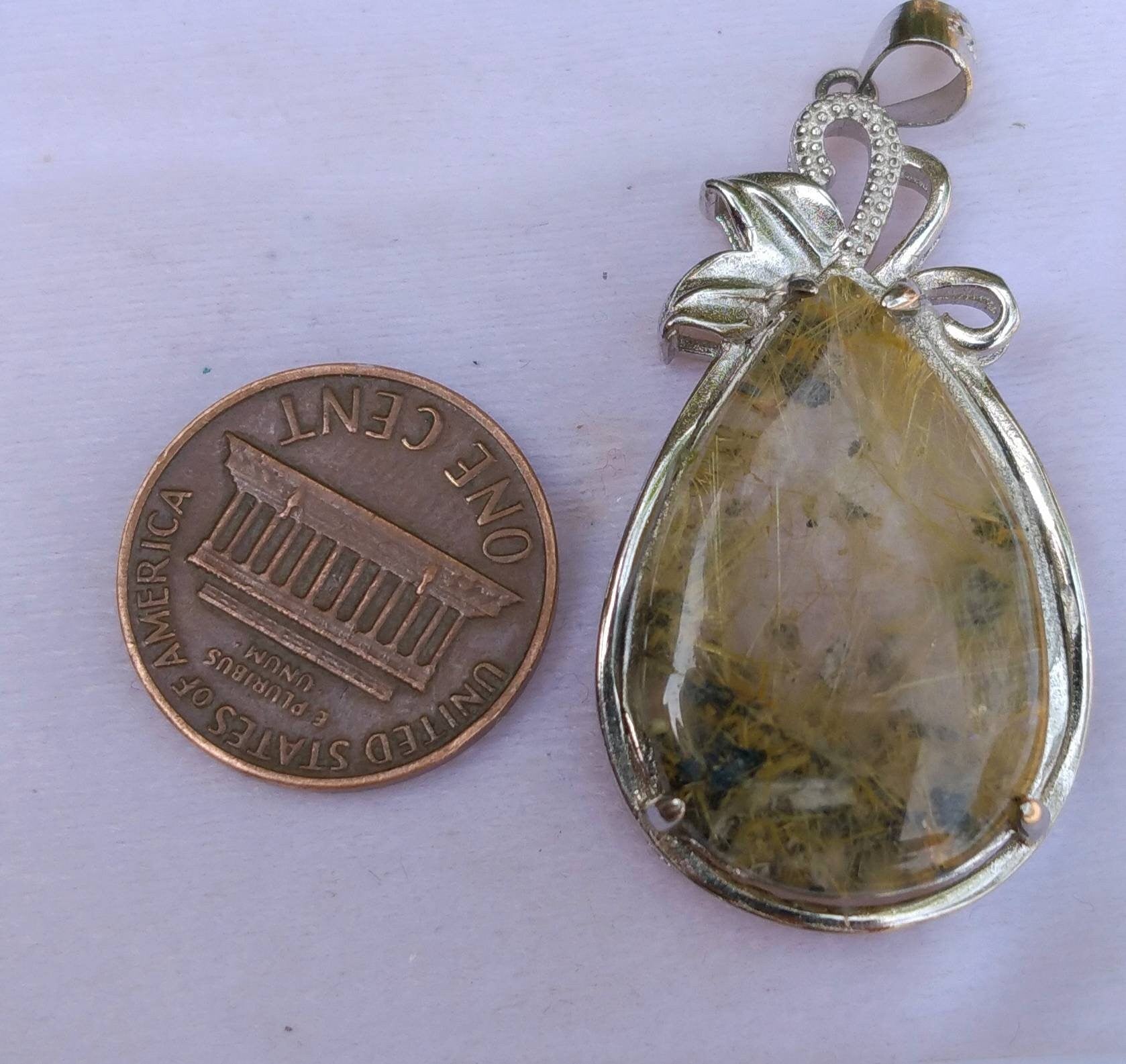 ARSAA GEMS AND MINERALSNatural good quality beautiful pear shape golden rutile included quartz sterling silver pendant - Premium  from ARSAA GEMS AND MINERALS - Just $25.00! Shop now at ARSAA GEMS AND MINERALS