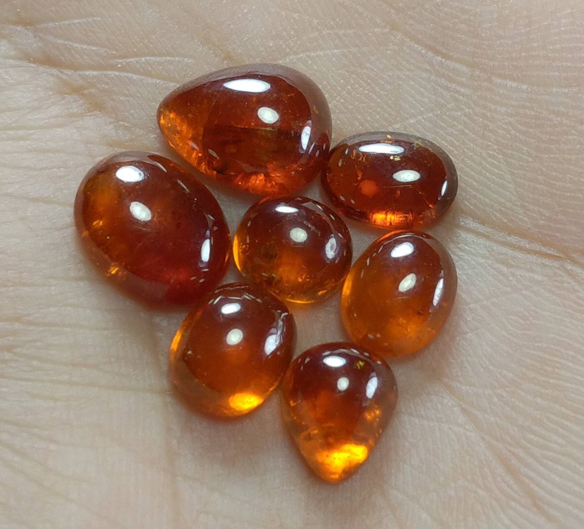 ARSAA GEMS AND MINERALSNatural top quality beautiful 31 carats small lot of spessartine garnet Cabochons - Premium  from ARSAA GEMS AND MINERALS - Just $60.00! Shop now at ARSAA GEMS AND MINERALS