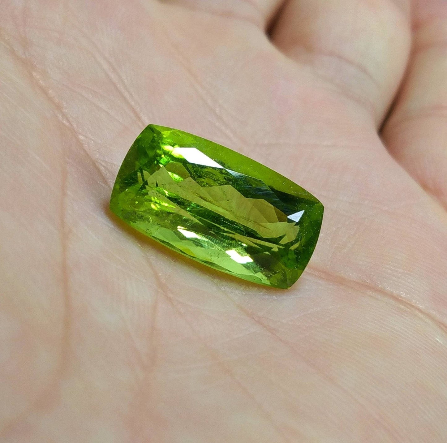 ARSAA GEMS AND MINERALSNatural high quality beautiful 15 carats green faceted radiant shape peridot gem - Premium  from ARSAA GEMS AND MINERALS - Just $335.00! Shop now at ARSAA GEMS AND MINERALS