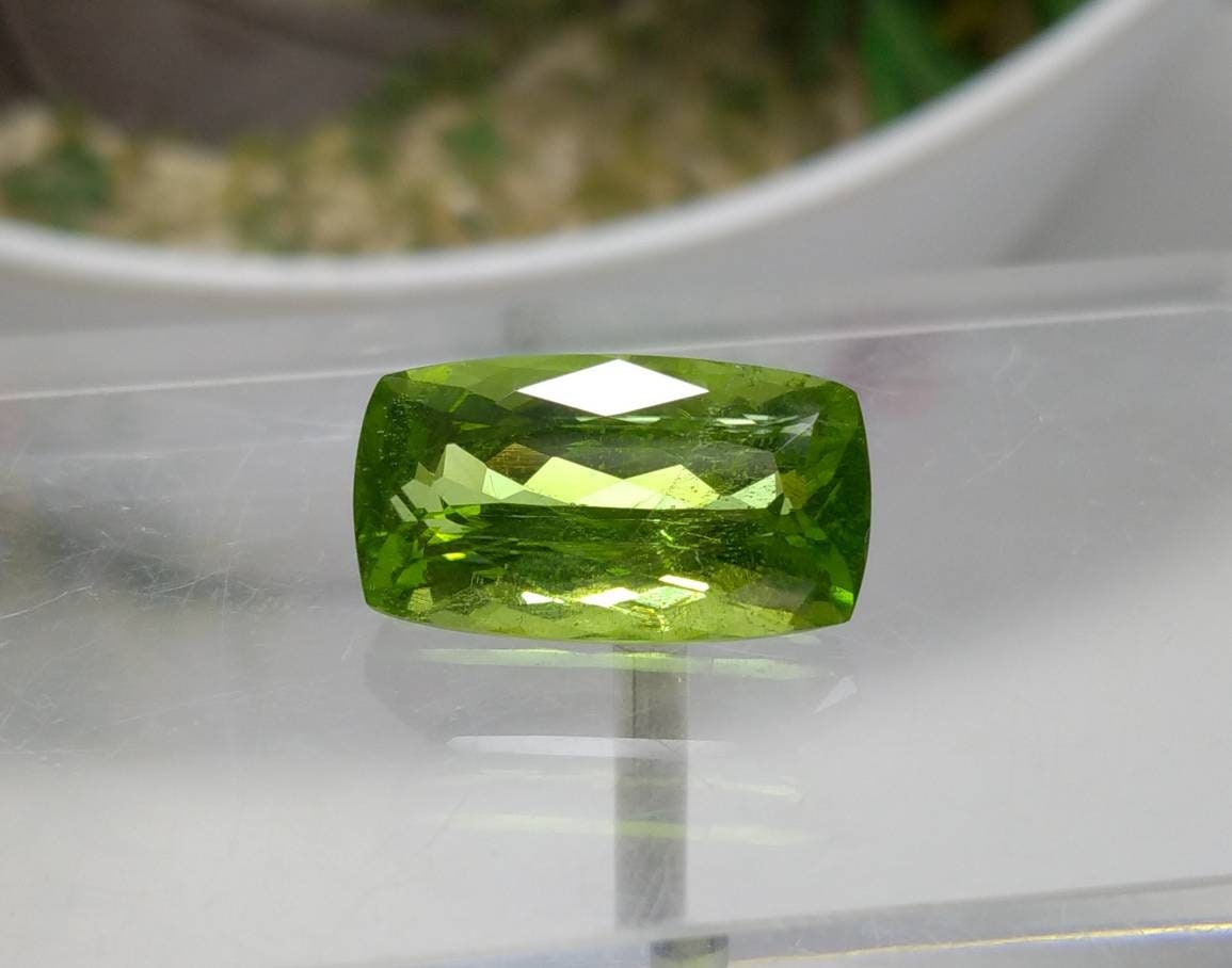 ARSAA GEMS AND MINERALSNatural high quality beautiful 15 carats green faceted radiant shape peridot gem - Premium  from ARSAA GEMS AND MINERALS - Just $335.00! Shop now at ARSAA GEMS AND MINERALS