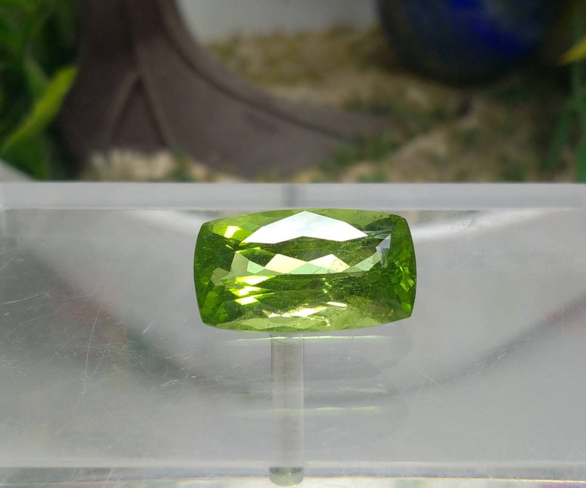 ARSAA GEMS AND MINERALSNatural high quality beautiful 15 carats green faceted radiant shape peridot gem - Premium  from ARSAA GEMS AND MINERALS - Just $335.00! Shop now at ARSAA GEMS AND MINERALS