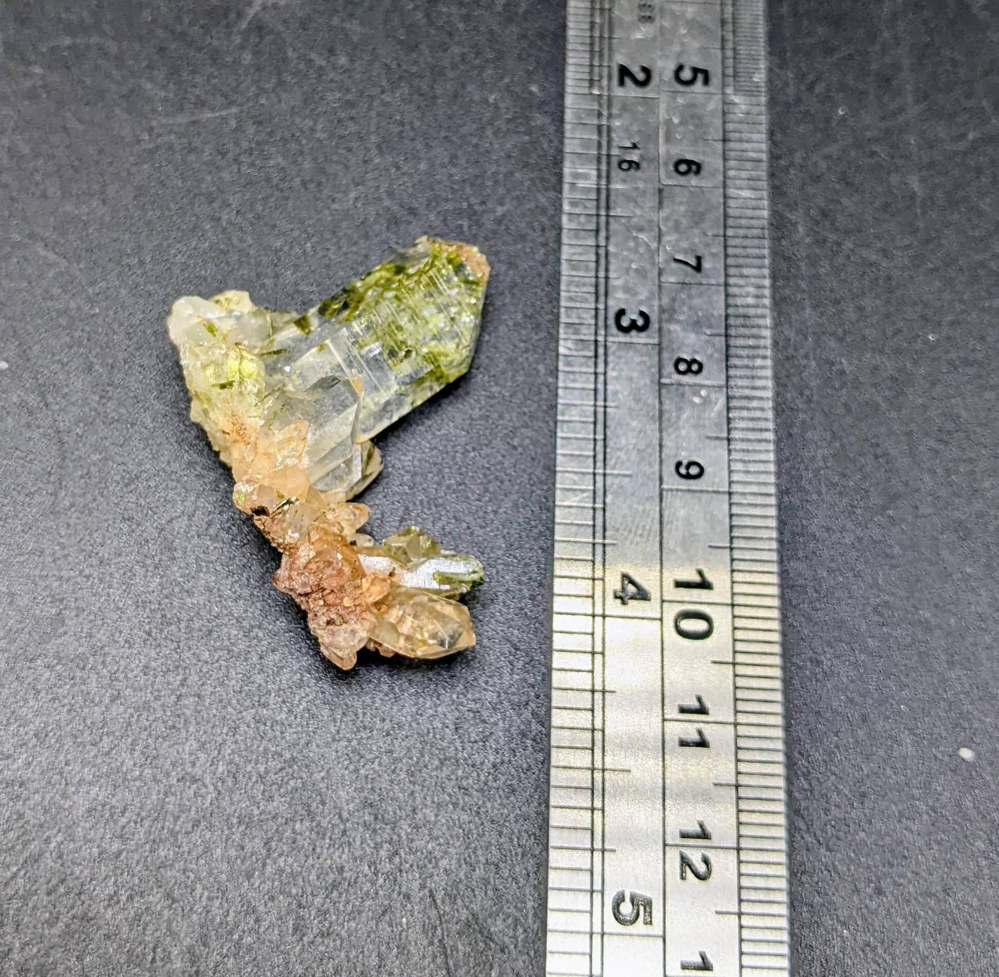 ARSAA GEMS AND MINERALSGreen epidote inclusion in transparent quartz crystal from Pakistan, weight: 10 grams - Premium  from ARSAA GEMS AND MINERALS - Just $30.00! Shop now at ARSAA GEMS AND MINERALS