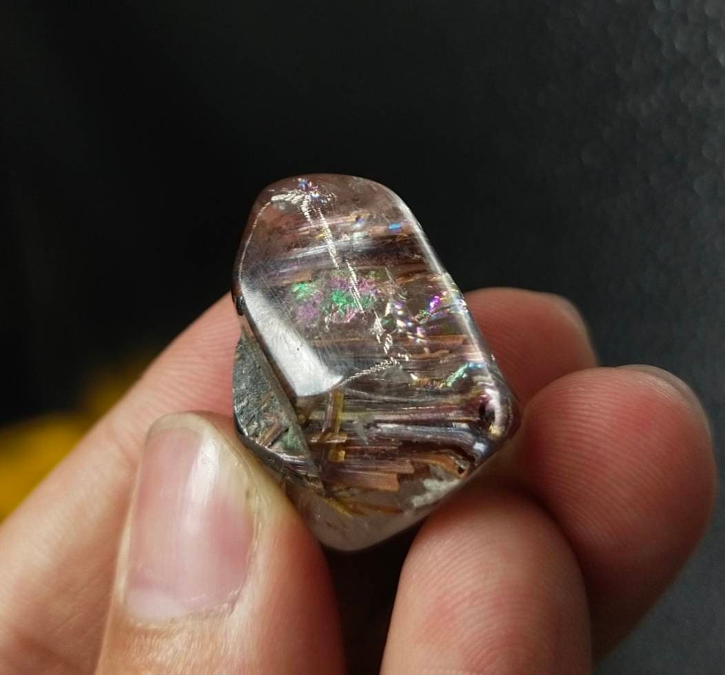 ARSAA GEMS AND MINERALSNatural rutile quartz with hematite inclusion polished tumble with nice rainbow, 13.6 grams - Premium  from ARSAA GEMS AND MINERALS - Just $40.00! Shop now at ARSAA GEMS AND MINERALS